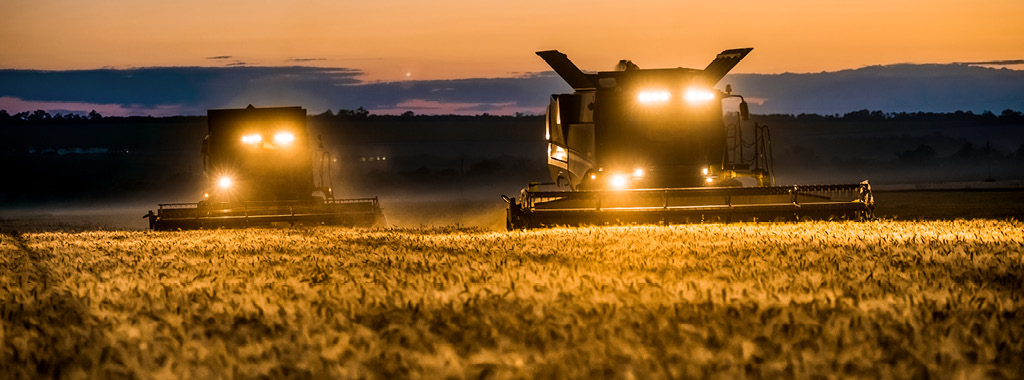 Combine at dusk